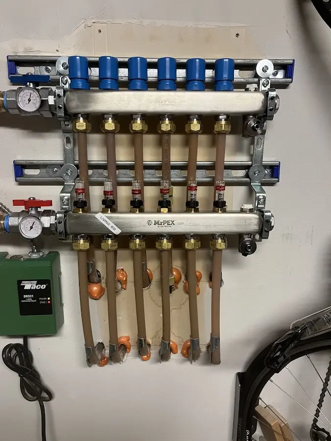 Plumber performing Water Heater Repair at a residential property in Brentwood